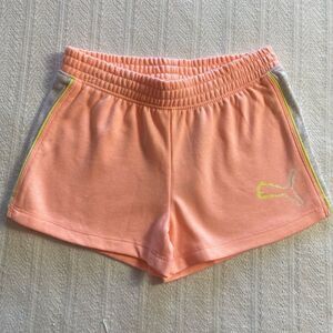 PUMA Girls Rebel Shorts Color: Elektro Peach